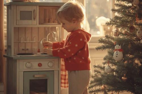 Toddler playing with a toy kitchen for Christmas holiday fun