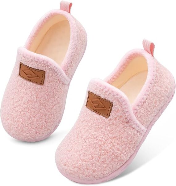 Soft, pink slippers for toddlers. Perfect for chilly days at home.