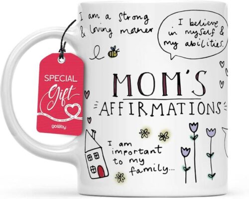 Coffee mug with mom affirmations sitting on a cozy table, representing everyday Amazon finds moms use daily