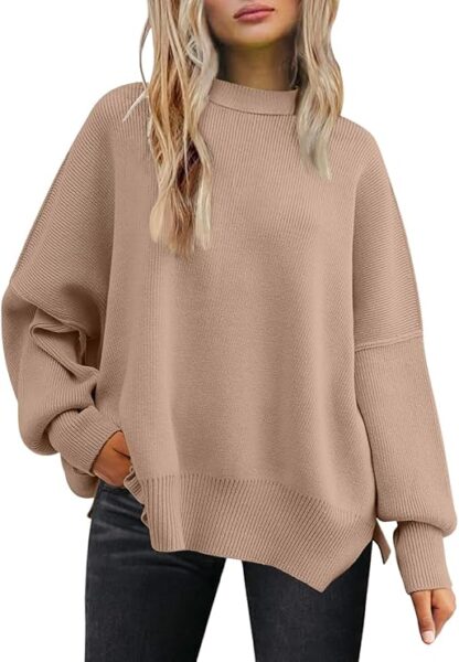 A beige oversized batwing sweater for women. Perfect sweater to wear with leggings.