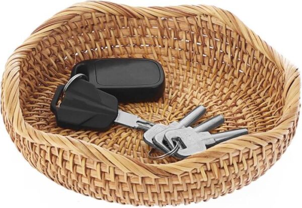 Small woven basket for smaller items, like keys, wallet and sunglasses. Perfect for an entryway.